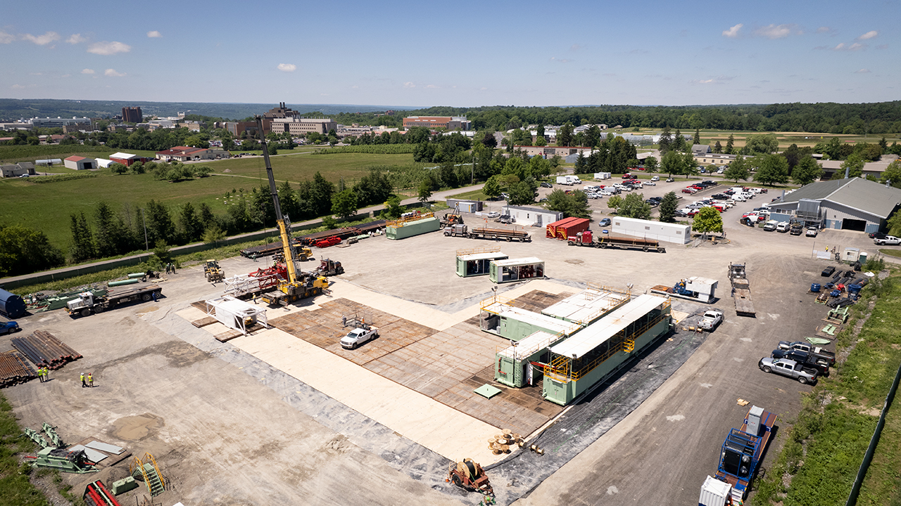 Equipment is being set up on the Cornell University Borehole Observatory (CUBO) site.